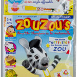 Mise sous film sans soudure apparente de magazine avec accessoire offert par zouzous